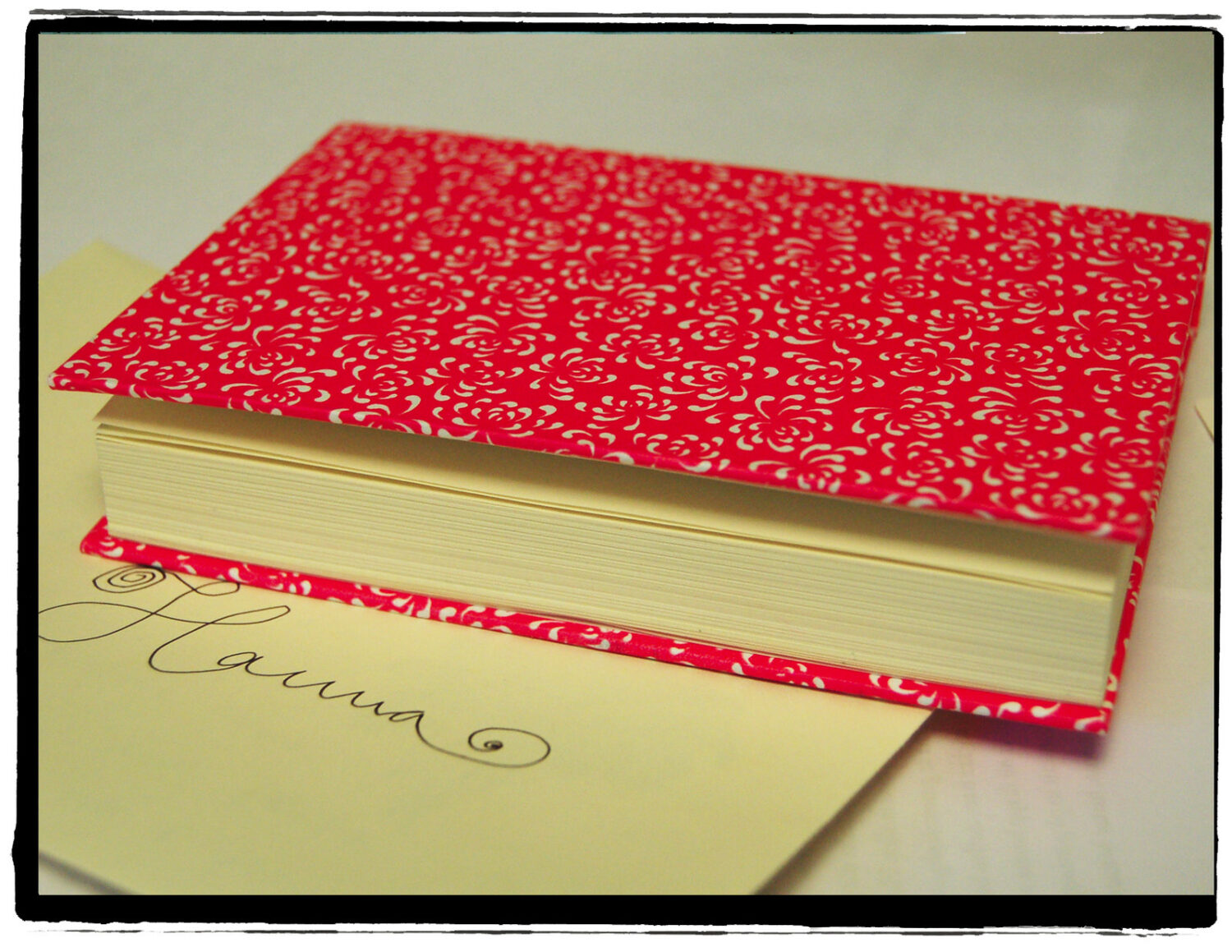 Book of Poetry writing notebook pink cover (copyright Hanna Andersson)