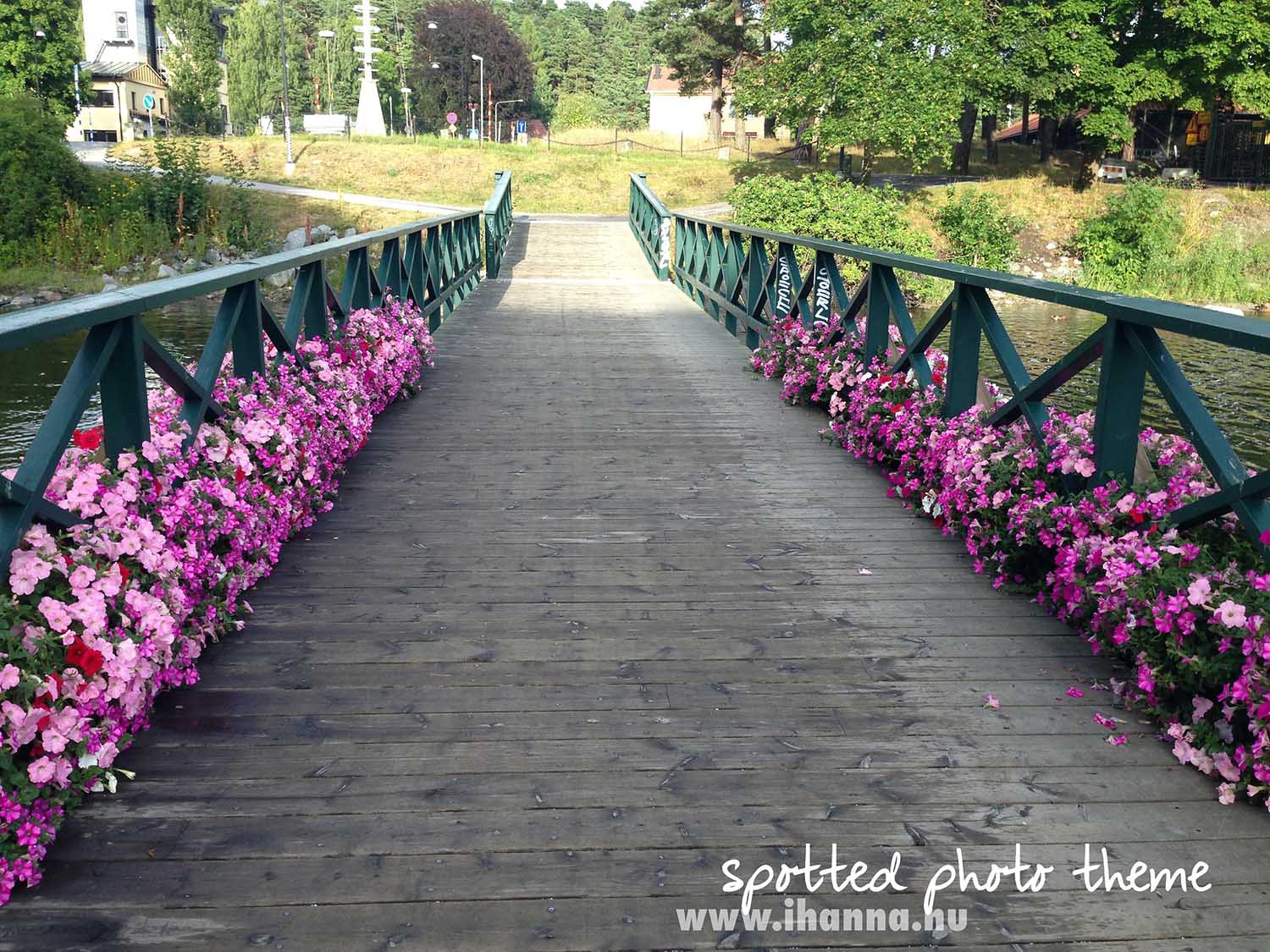 Bridge to nature decorated in pink flowers (Photo copyright Hanna Andersson)