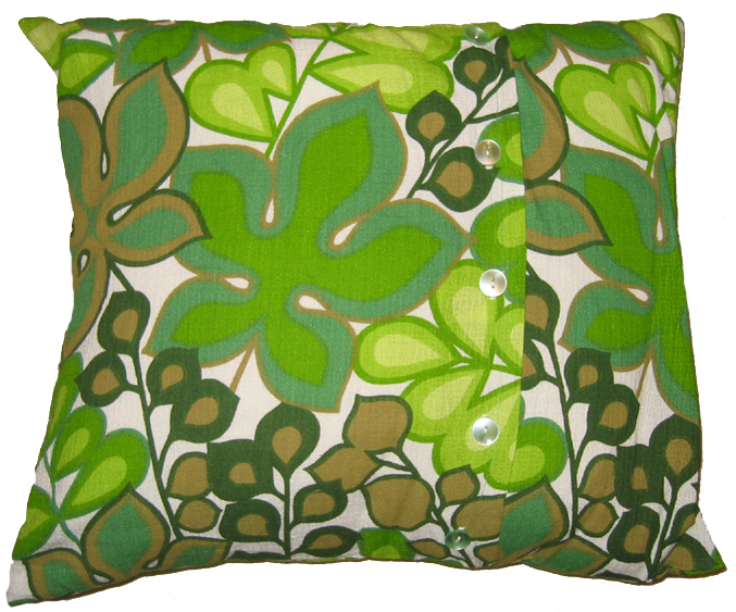 Green pillow of fabric scraps from a friend (Photo copyright Hanna Andersson)