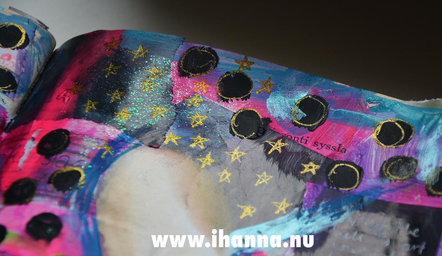 Art Journal detail with painted dots and gold stars in altered book, by iHanna in 2024 (Photo copyright Hanna Andersson)