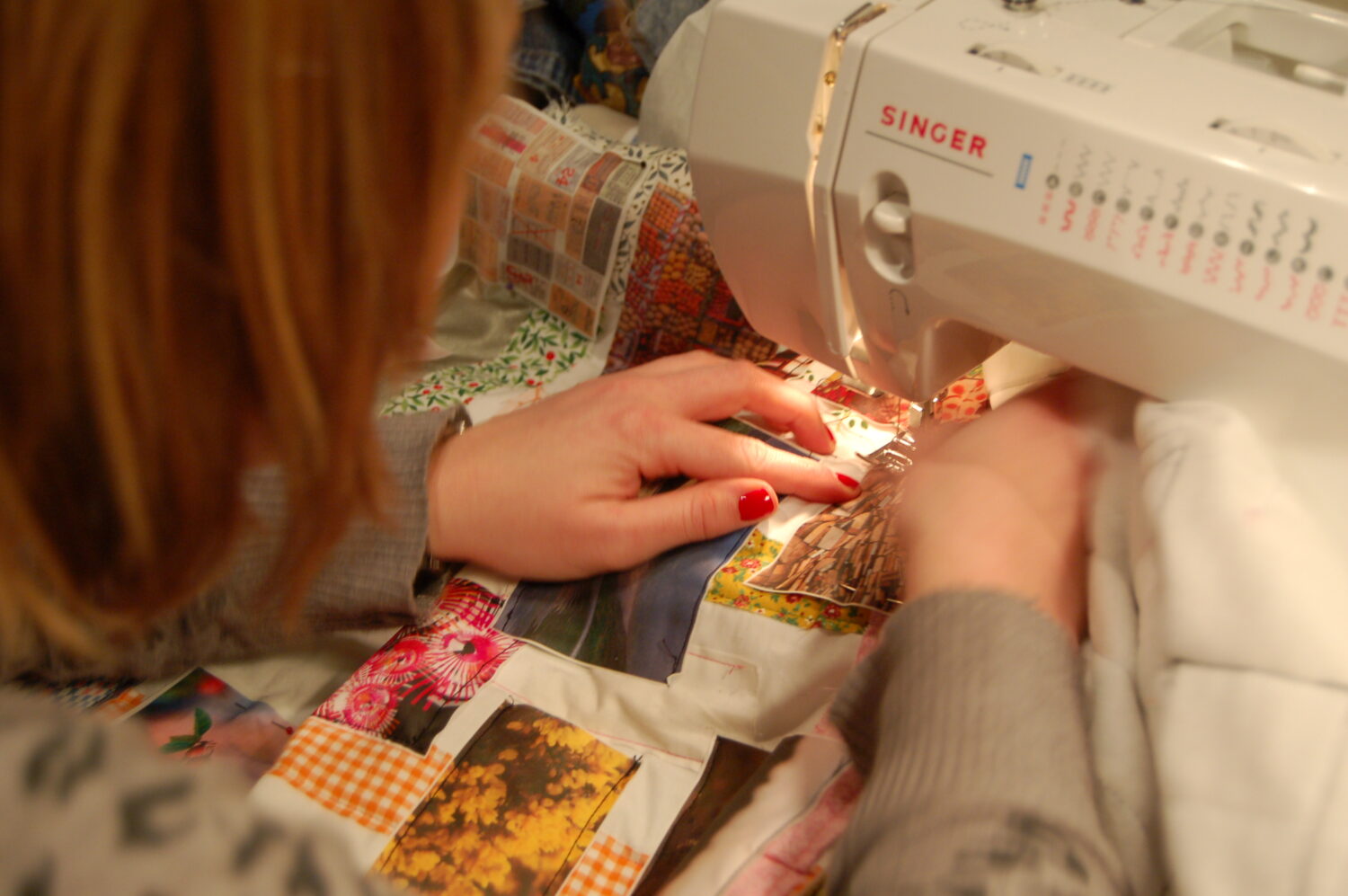 Cousin Charlie sewing the Photo Quilt of Inspiration together (Photo Copyright Hanna Andersson, Studio iHanna)